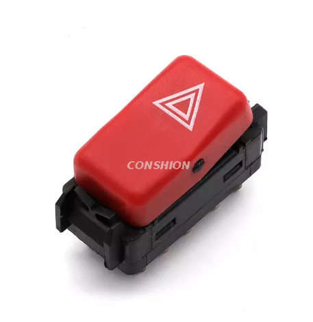 A close-up view of a car's hazard warning lights flashing, with the red triangle button on the dashboard illuminated.